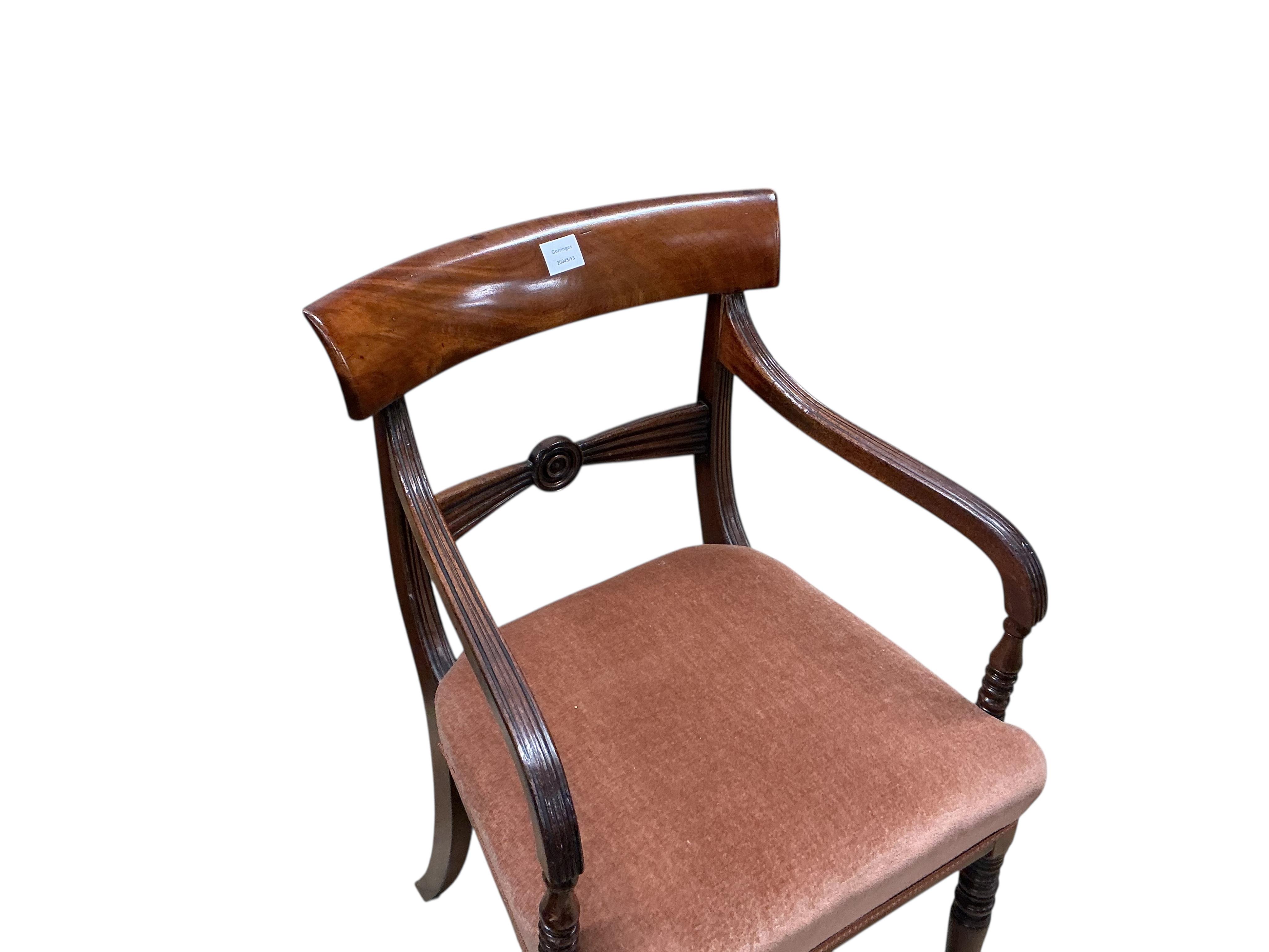 Two early 19th century mahogany elbow chairs, larger 54cm, depth 50cm, height 91cm